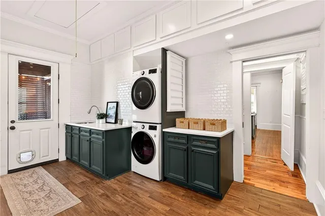 a view of a porch with wooden floor and iron stairs