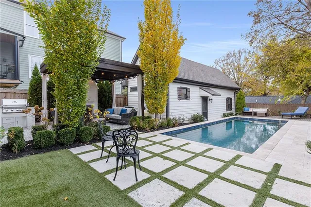 a kitchen with a stove and a refrigerator