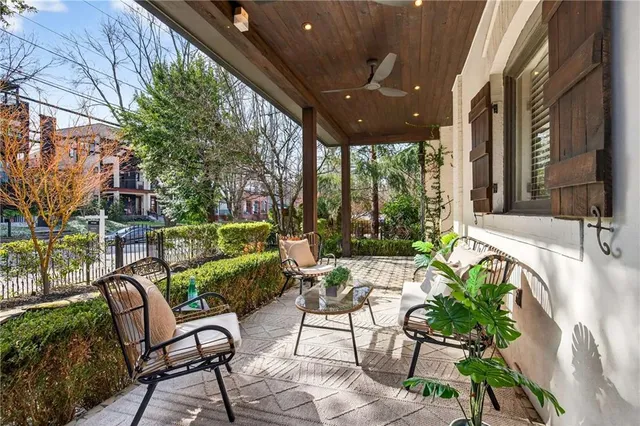 a view of a hallway view with wooden floor and staircase