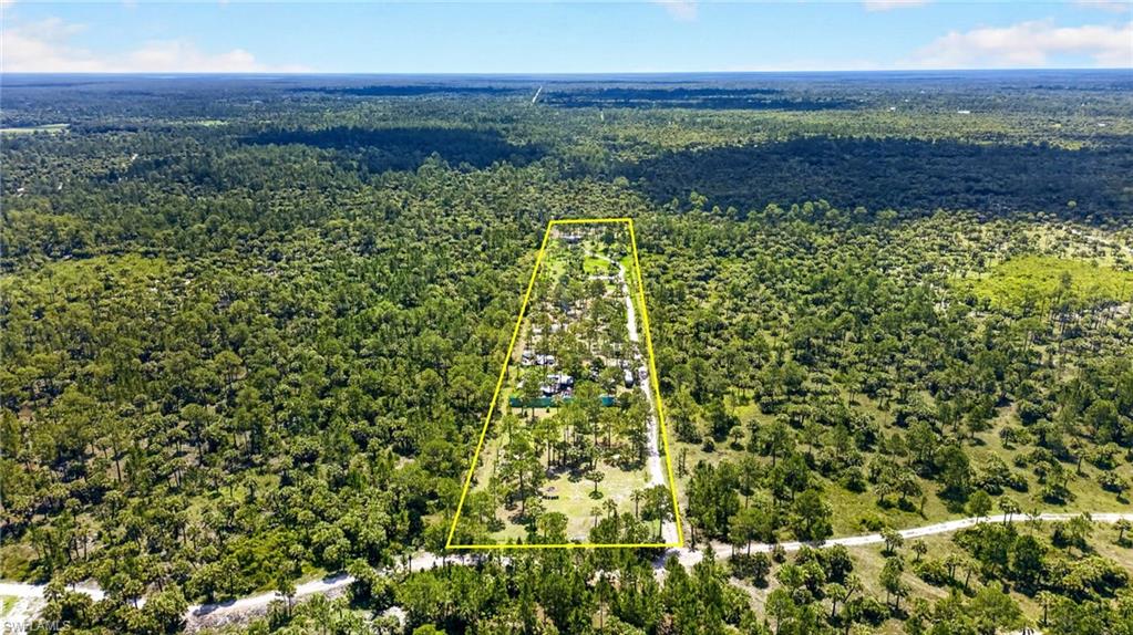 Naples Fl Naples Way Naples, FL 34117 - Photo 1 of 12 Expansive parcel of land bordered by mature trees and natural vegetation
