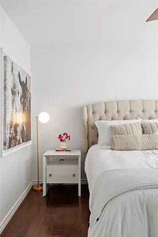 a room with a bed and a window