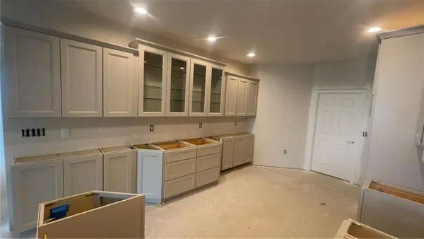 a storage & utility room with sink washer and dryer