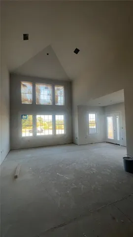 a view of a room next to a window