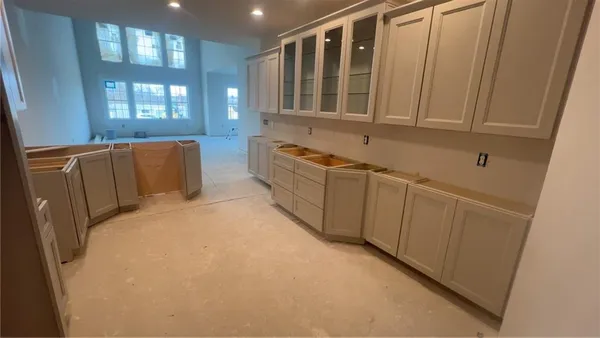 a room with windows and closet