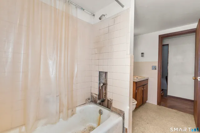a bathroom with a sink and a shower