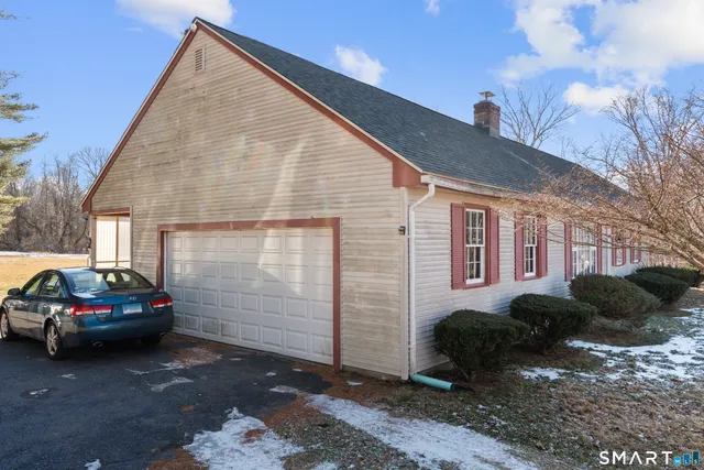 a car parked in front of a house