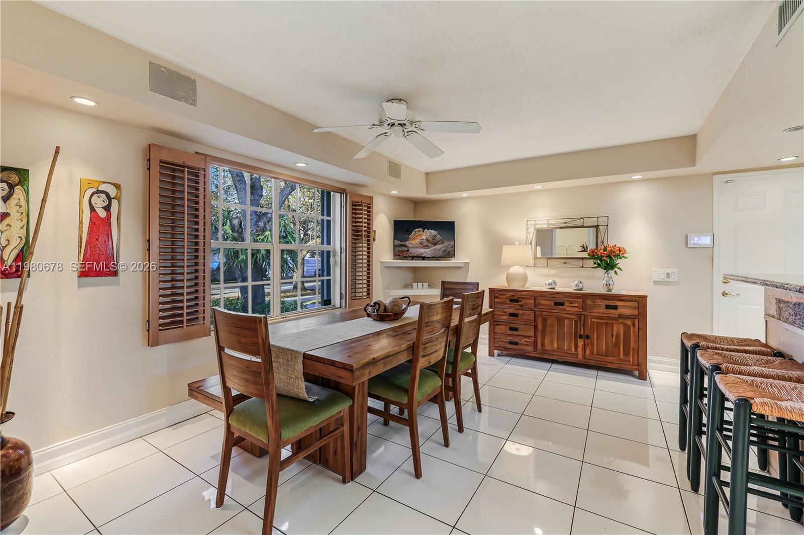 14952 Southwest 149th Street Miami, FL 33196 - Photo 24 of 64 a view of a dining room with furniture window and outside view