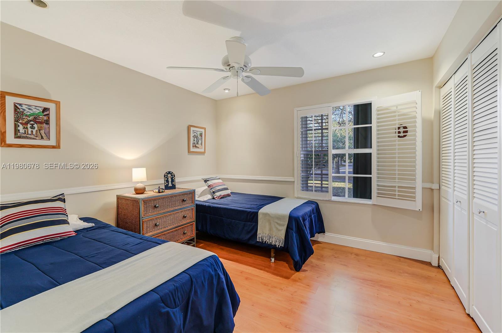 14952 Southwest 149th Street Miami, FL 33196 - Photo 35 of 64 a bedroom with a bed and a window