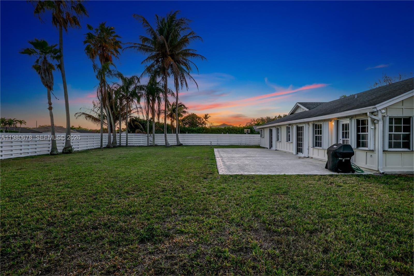 14952 Southwest 149th Street Miami, FL 33196 - Photo 38 of 64 a view of a house with a yard