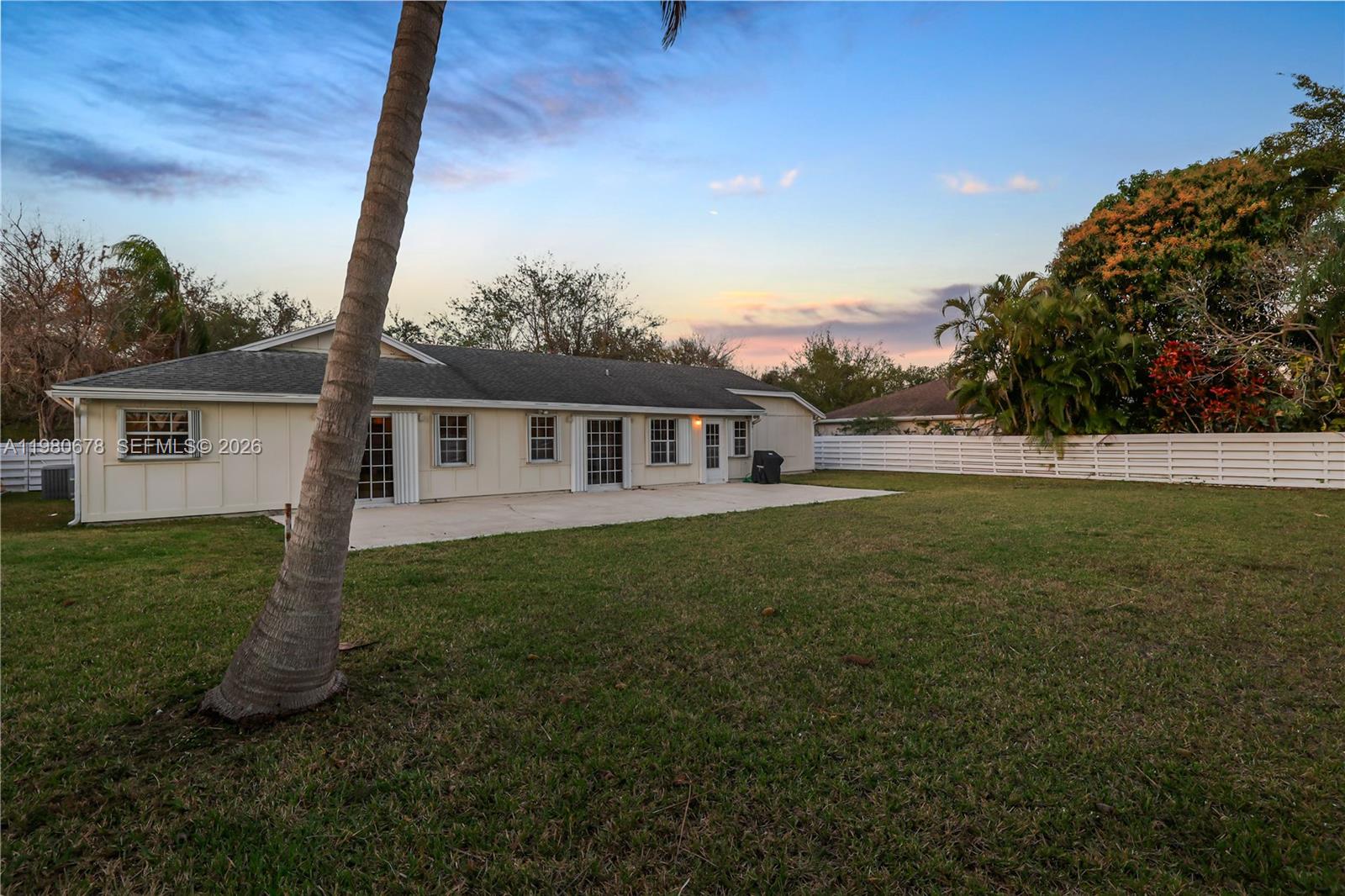 14952 Southwest 149th Street Miami, FL 33196 - Photo 43 of 64 a front view of a house with garden