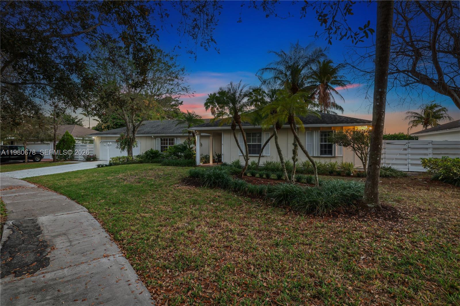 14952 Southwest 149th Street Miami, FL 33196 - Photo 46 of 64 a view of a house with a yard