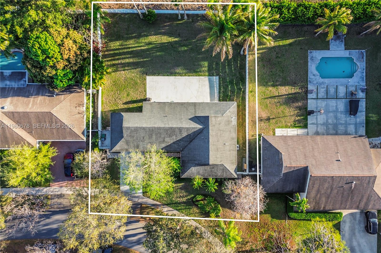 14952 Southwest 149th Street Miami, FL 33196 - Photo 48 of 64 aerial view of a house with a yard and potted plants