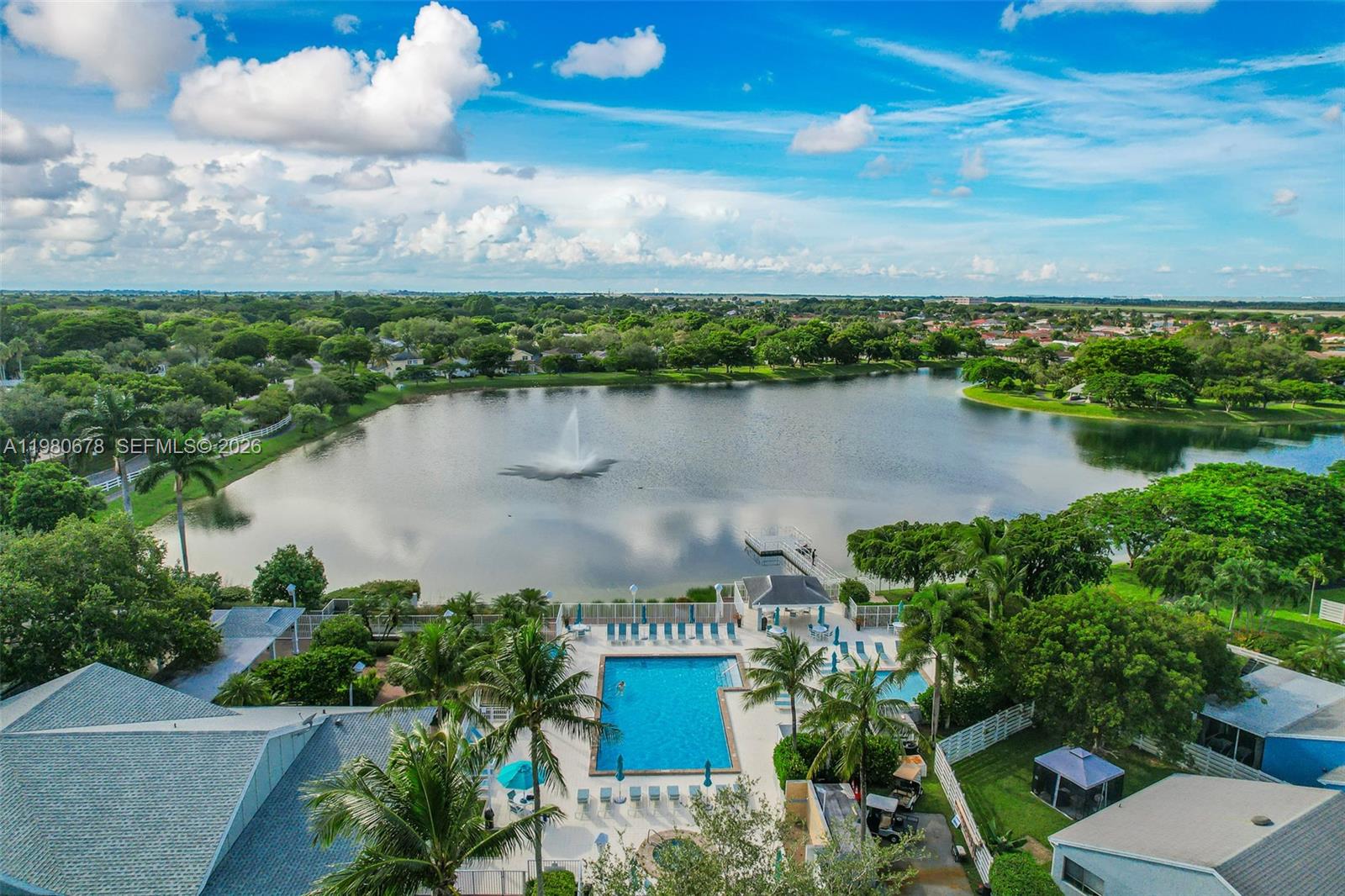 14952 Southwest 149th Street Miami, FL 33196 - Photo 56 of 64 an aerial view of a residential houses with outdoor space and lake view