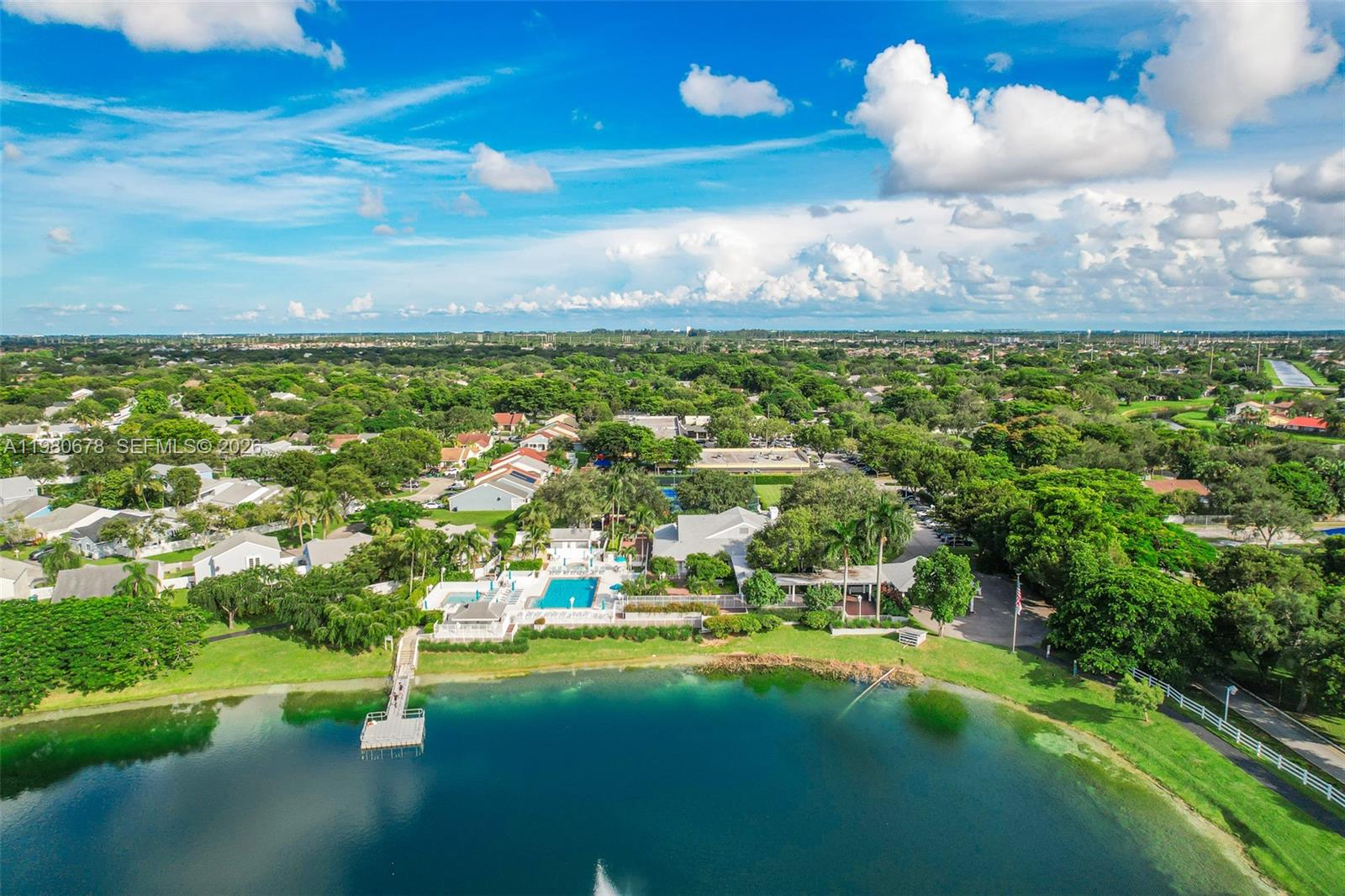 14952 Southwest 149th Street Miami, FL 33196 - Photo 60 of 64 a view of a golf course with a swimming pool