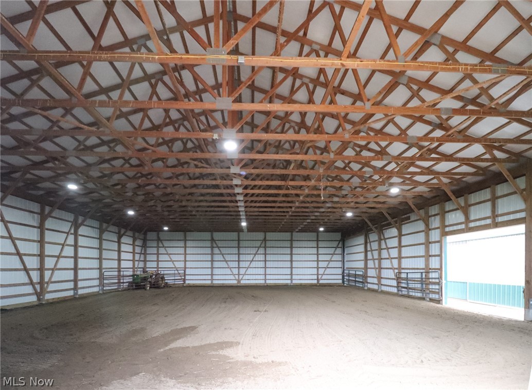 1153 East Pleasant Home Road Wooster, OH 44691 - Photo 4 of 48 60'x80' Indoor Riding Arena with 16 Foot ceiling and 14-foot doors.