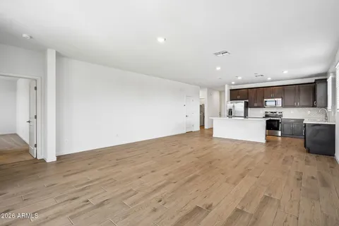 a view of kitchen with wooden floor