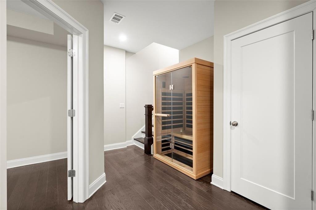293 Thompson Street Alpharetta, GA 30009 - Photo 44 of 71 an empty room with wooden floor and windows