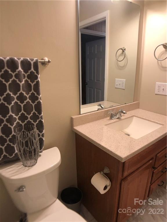 790 South Main Street Rutherfordton, NC 28139 - Photo 12 of 21 a bathroom with a sink toilet and mirror