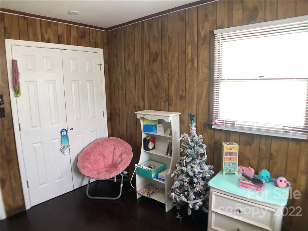 790 South Main Street Rutherfordton, NC 28139 - Photo 13 of 21 a room with furniture a chandelier and a window