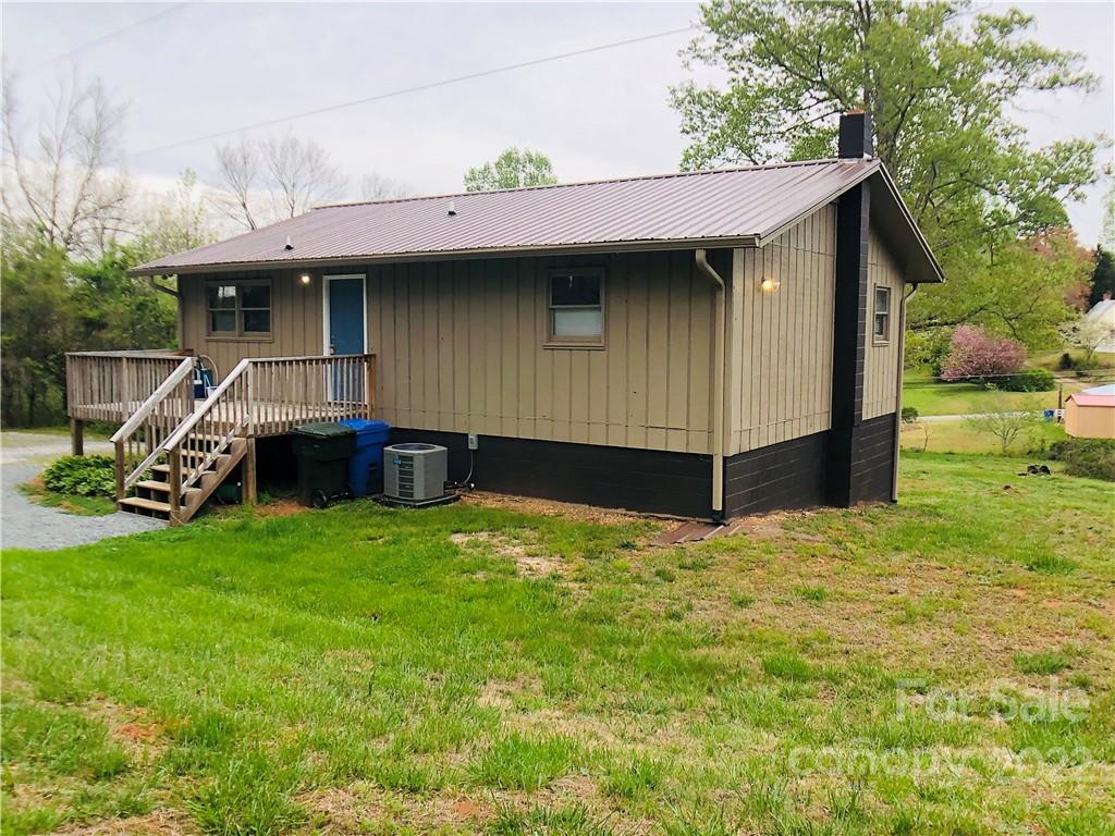 790 South Main Street Rutherfordton, NC 28139 - Photo 19 of 21 a front view of a house with a yard
