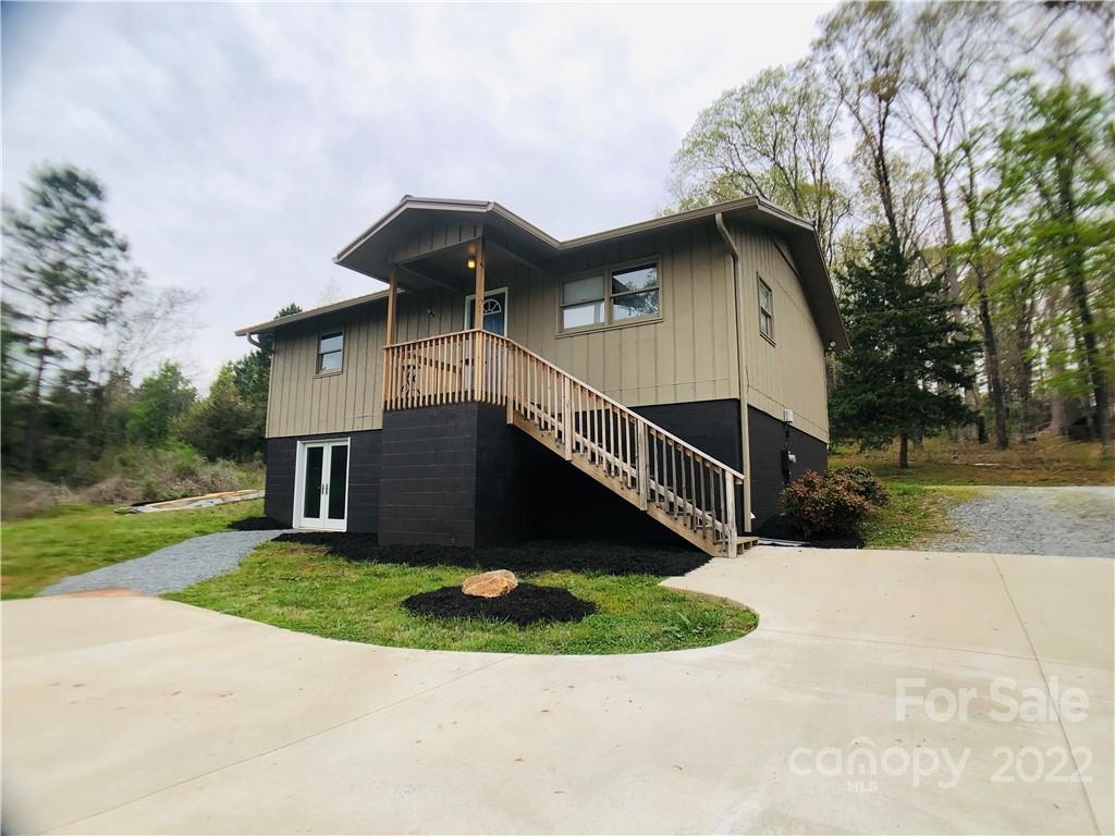790 South Main Street Rutherfordton, NC 28139 - Photo 21 of 21 a view of a house with a small yard and wooden fence