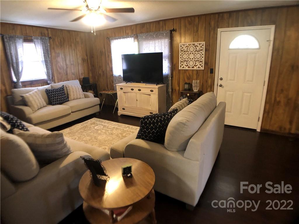 790 South Main Street Rutherfordton, NC 28139 - Photo 3 of 21 a living room with furniture and a flat screen tv