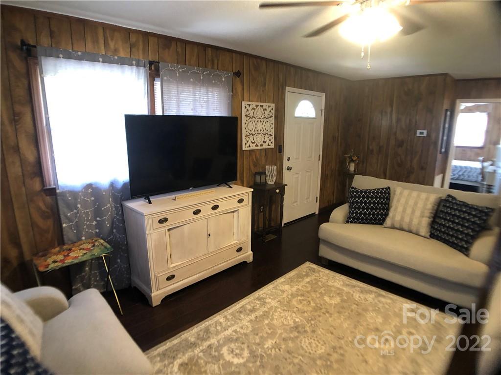 790 South Main Street Rutherfordton, NC 28139 - Photo 4 of 21 a living room with furniture and a flat screen tv