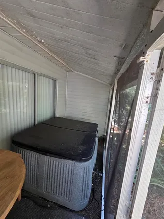 a kitchen with a white cabinets and white appliances