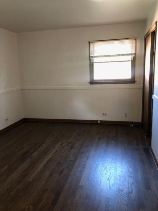 3707 Poplar Road Flossmoor, IL 60422 - Photo 9 of 10 an empty room with wooden floor and windows