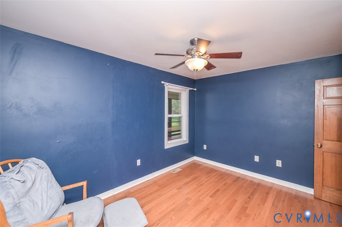 6040 Hare Road Henrico, VA 23231 - Photo 31 of 54 Hardwood-style flooring with white trim, a single