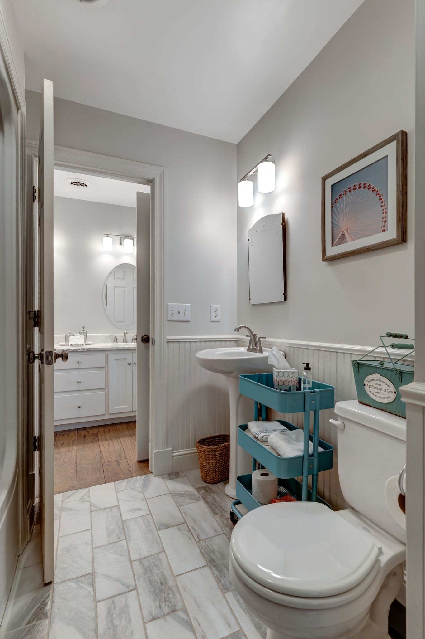1605 Big Springs Road Lebanon, TN 37087 - Photo 33 of 65 a bathroom with a toilet a sink and mirror