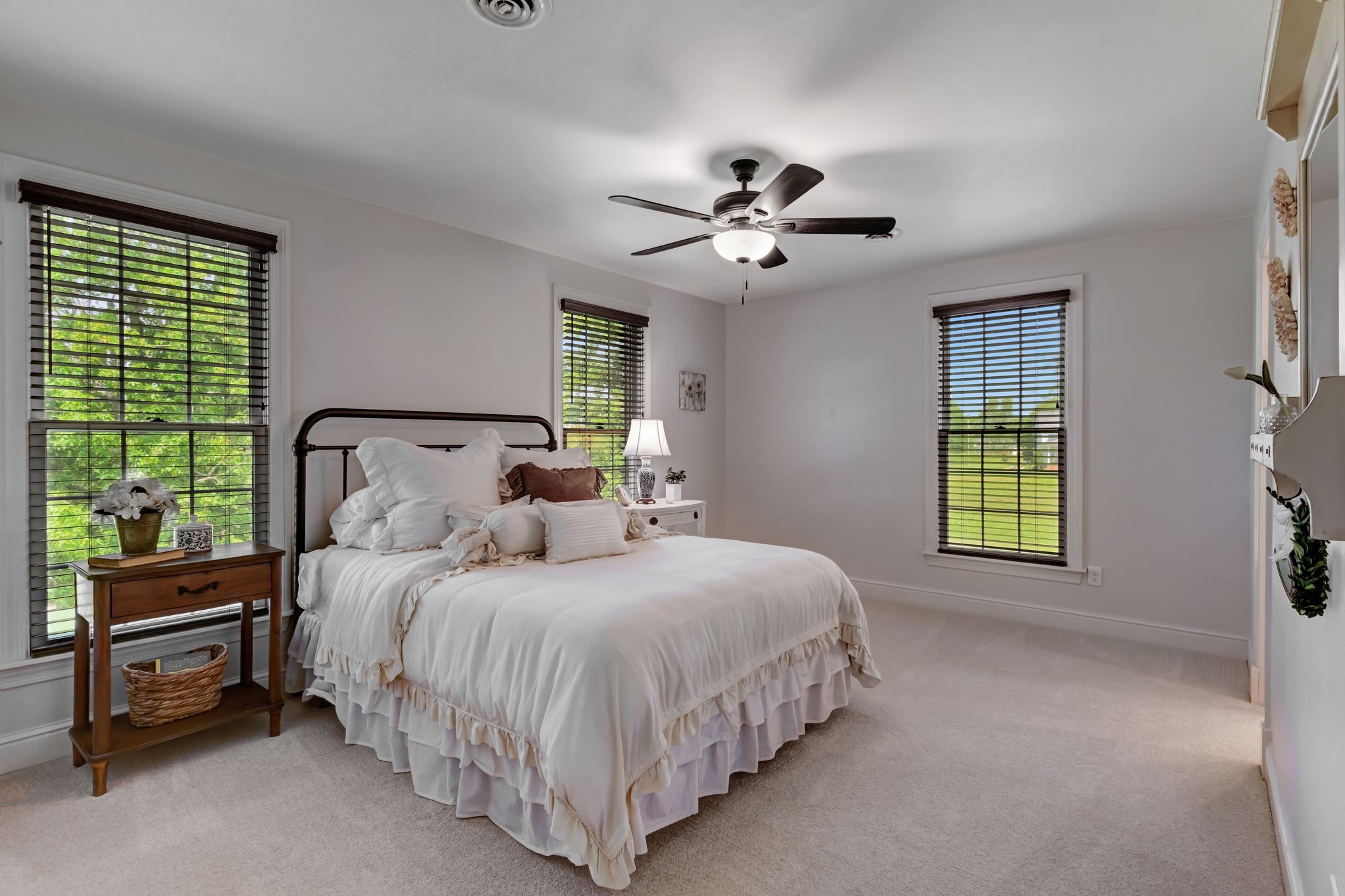 1605 Big Springs Road Lebanon, TN 37087 - Photo 35 of 65 a bedroom with a bed a chandelier and a window