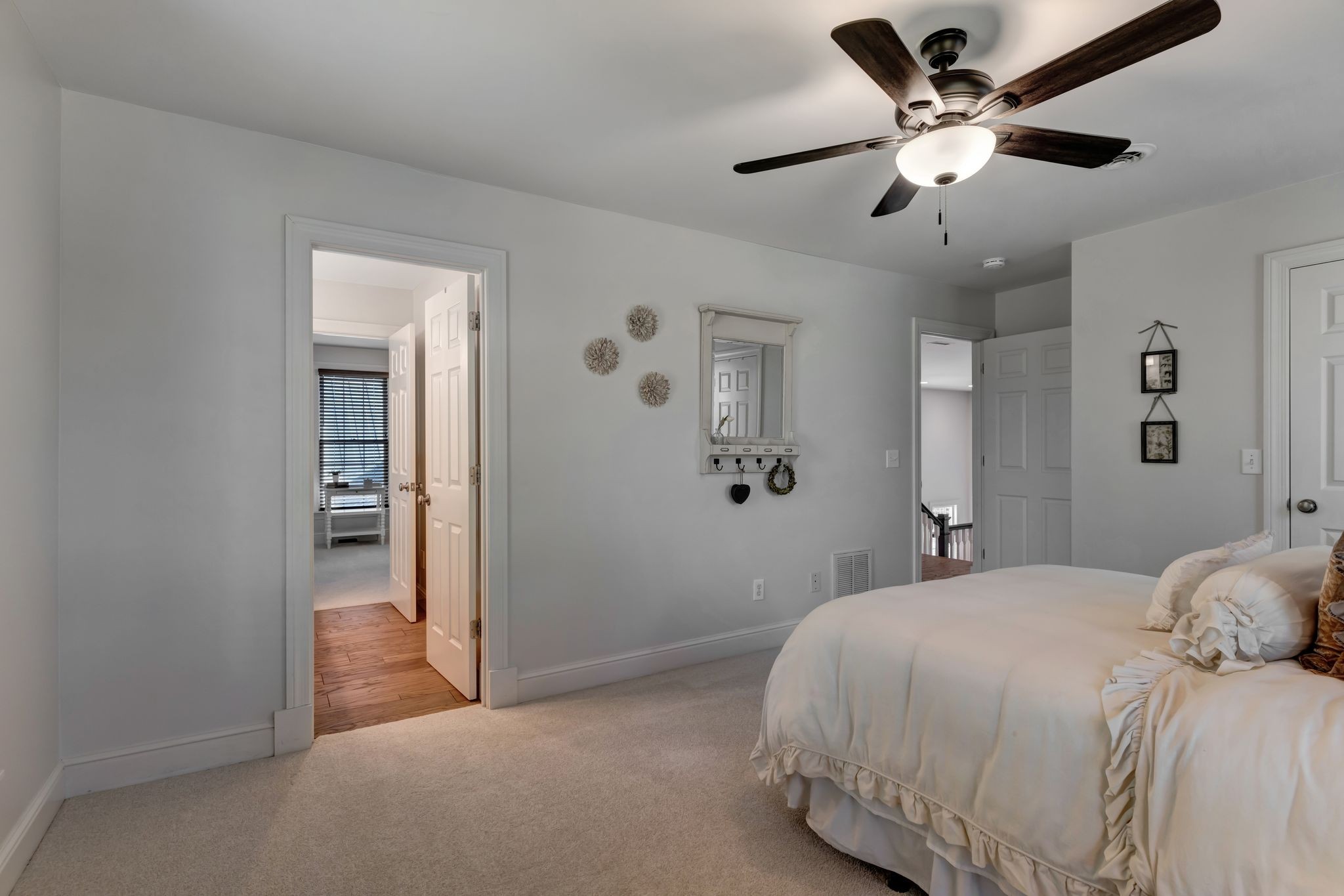 1605 Big Springs Road Lebanon, TN 37087 - Photo 36 of 65 a bedroom with a bed and a ceiling fan