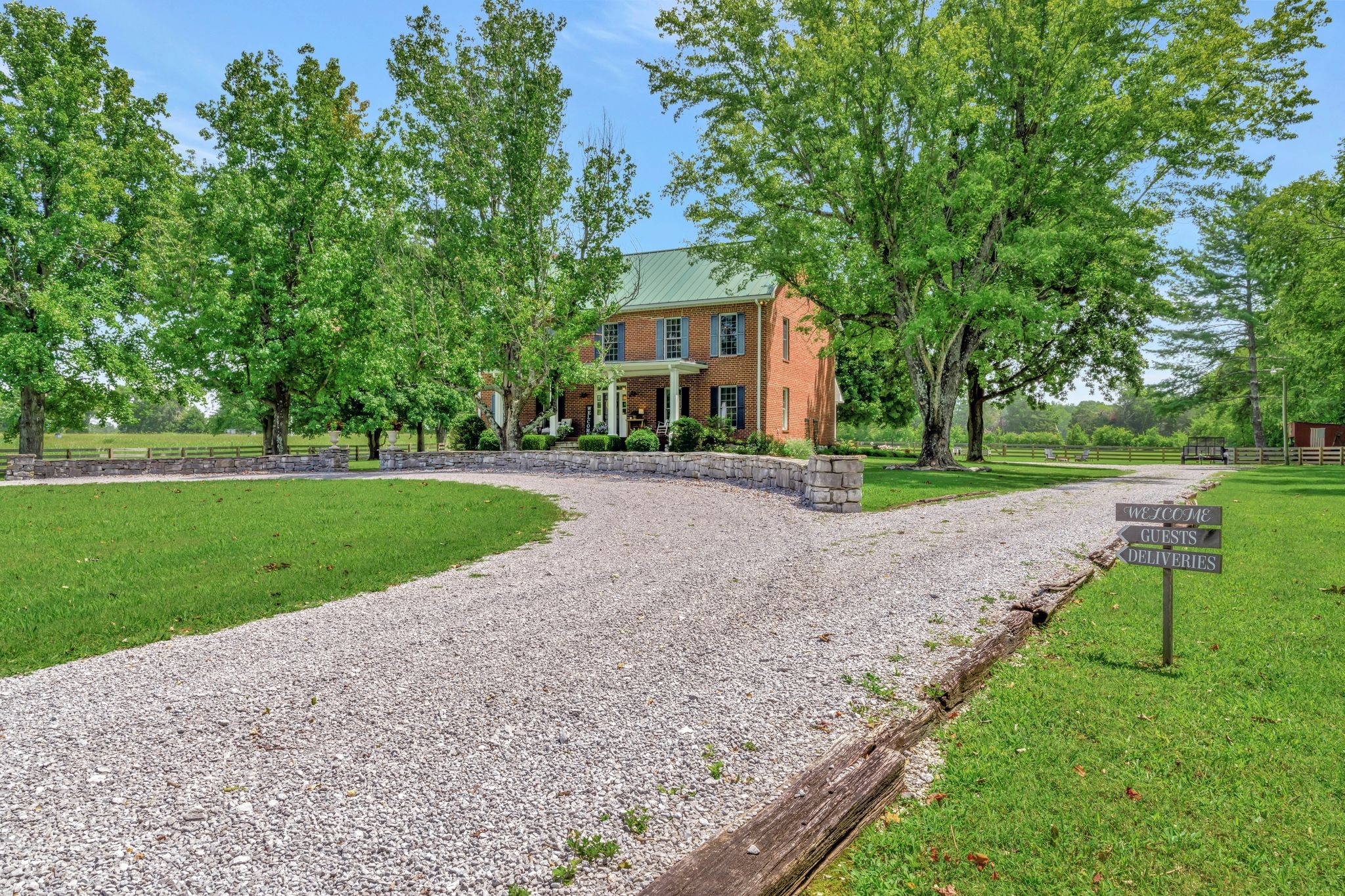 1605 Big Springs Road Lebanon, TN 37087 - Photo 4 of 65 a front view of a house with a yard and trees