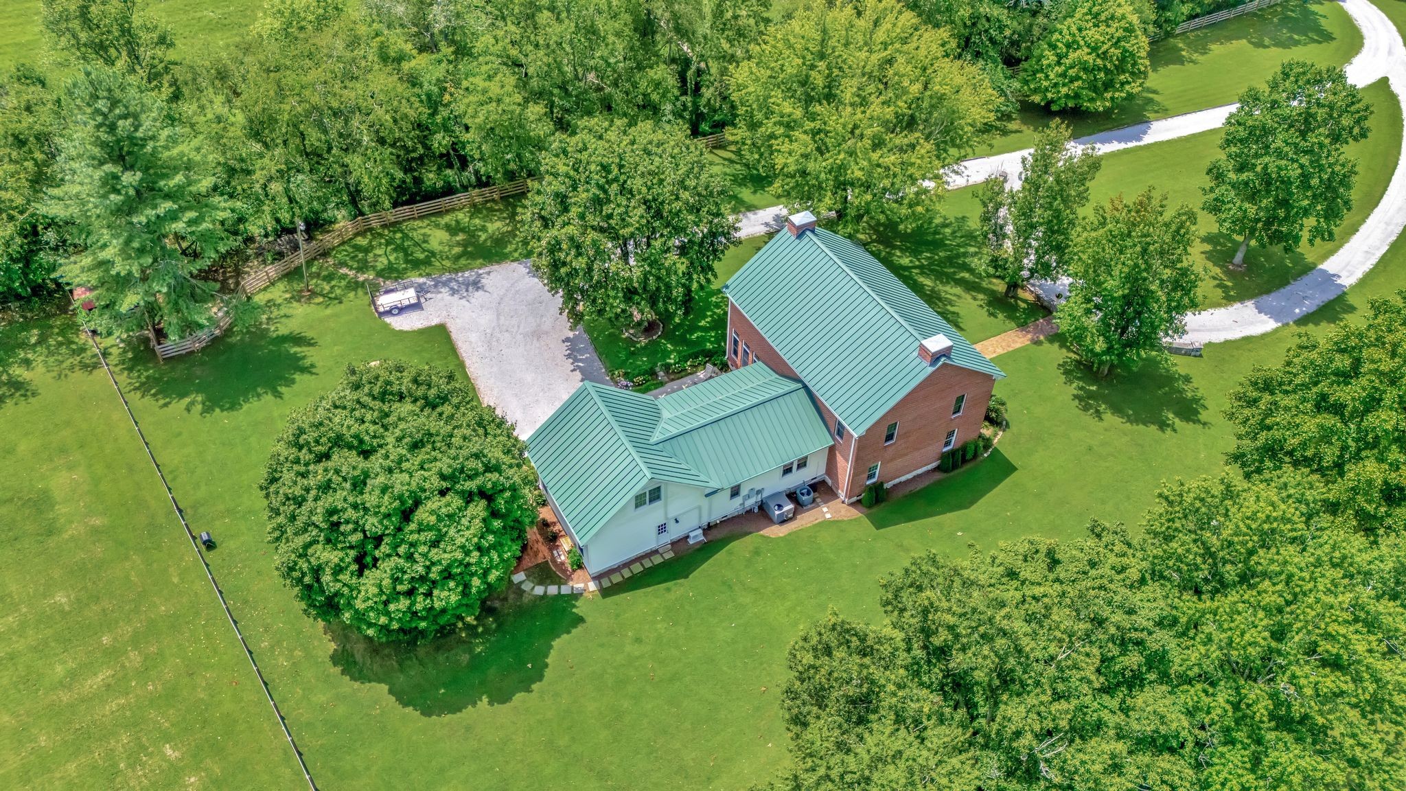 1605 Big Springs Road Lebanon, TN 37087 - Photo 43 of 65 an aerial view of a house with a garden and trees