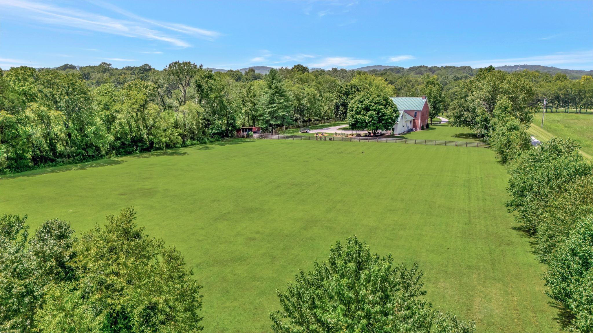 1605 Big Springs Road Lebanon, TN 37087 - Photo 49 of 65 a view of a green field with lots of bushes