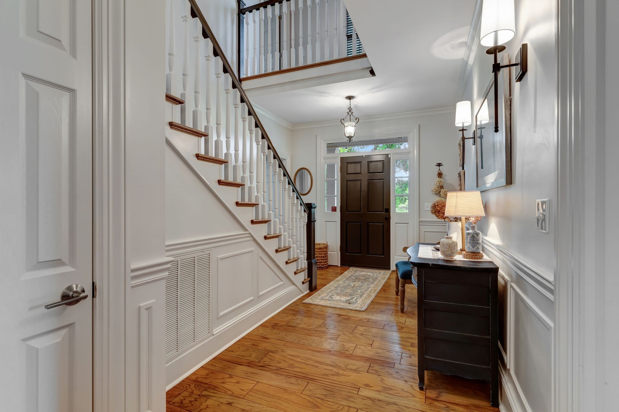 1605 Big Springs Road Lebanon, TN 37087 - Photo 10 of 65 a view of a hallway view with wooden floor and staircase