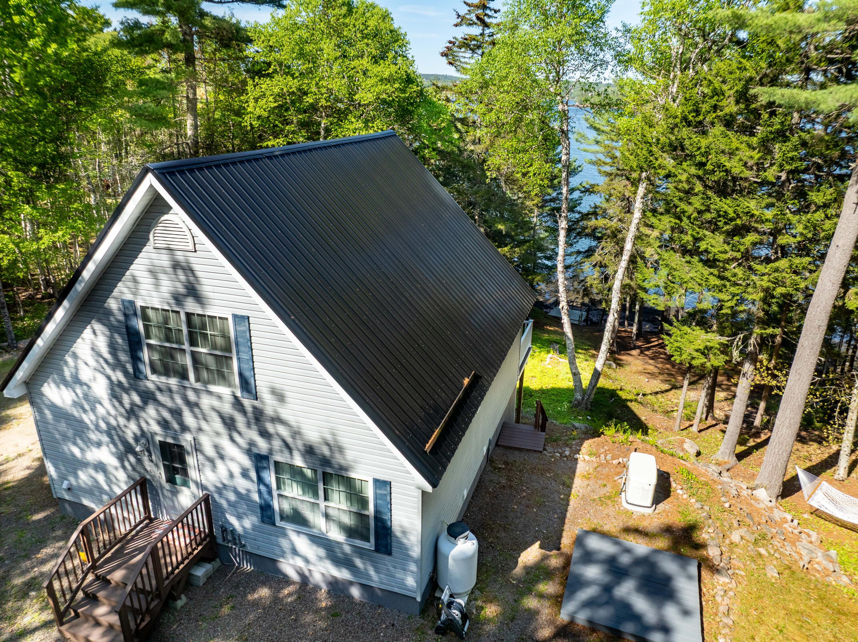 1590 South River Road Calais, ME 04619 - Photo 27 of 42 New metal roof in 2025