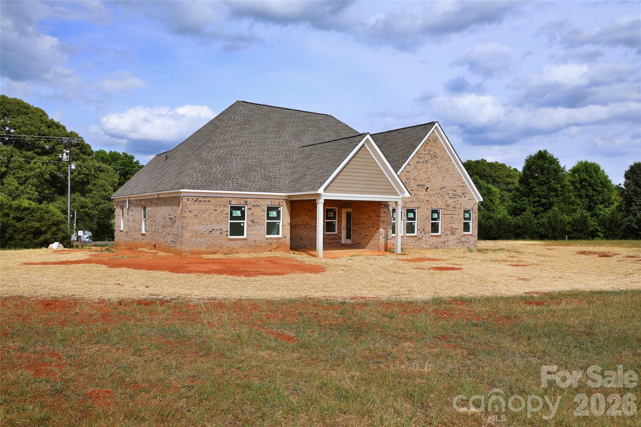 5646 Zion Church Road Concord, NC 28025 - Photo 2 of 8 a front view of a house with a yard and garage