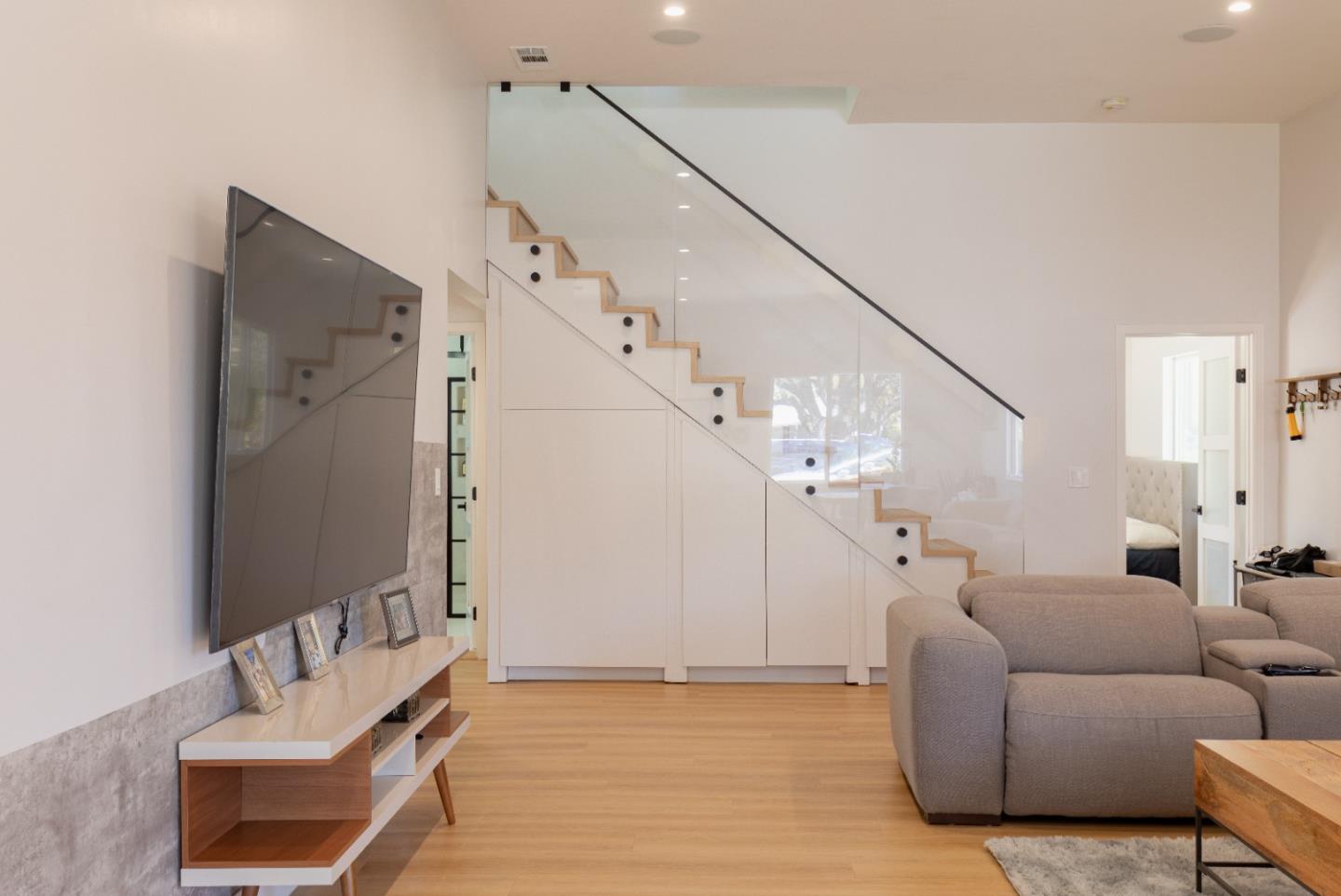21446 Broadway Road Los Gatos, CA 95033 - Photo 12 of 32 a living room with furniture and stairs
