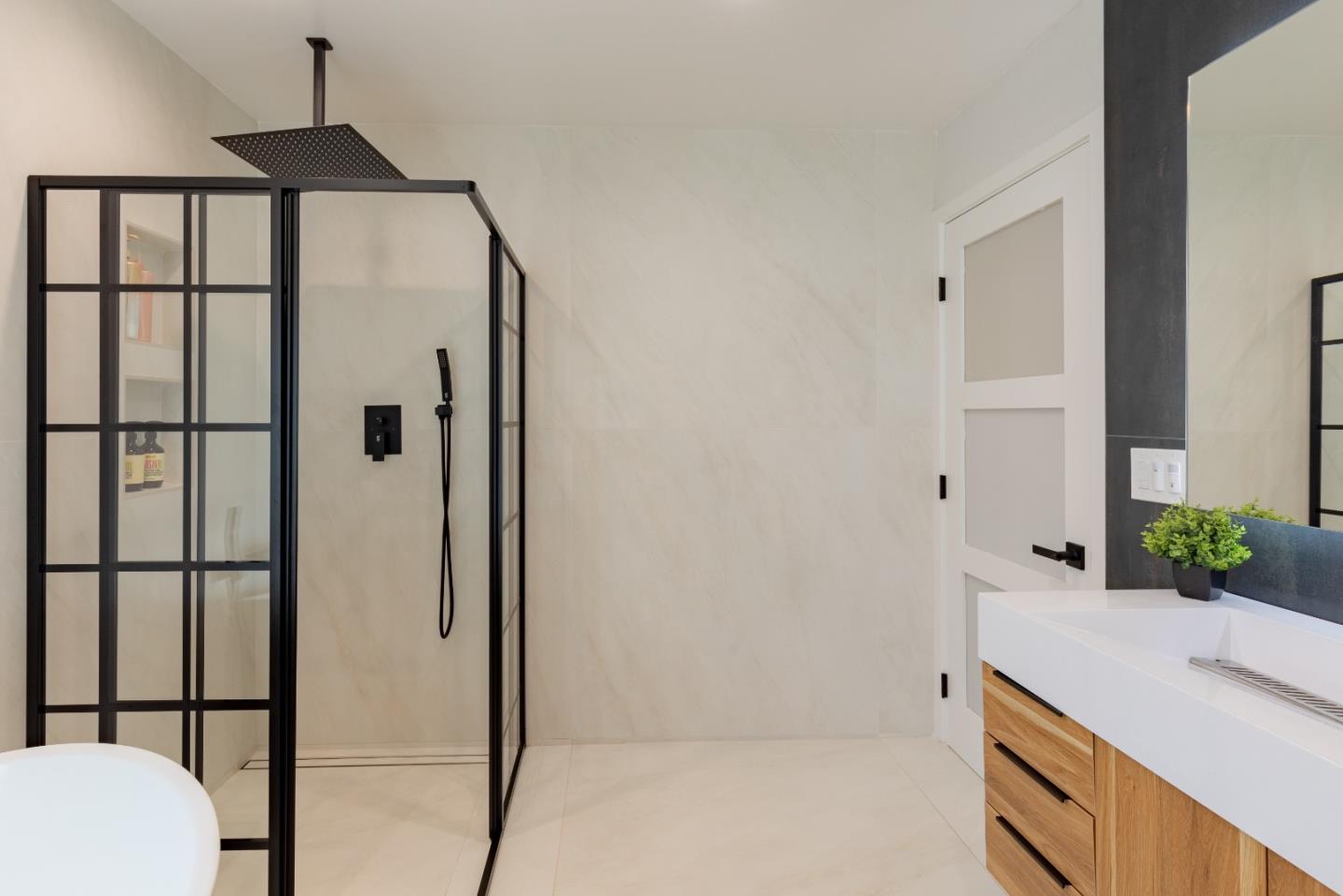 21446 Broadway Road Los Gatos, CA 95033 - Photo 20 of 32 a bathroom with a granite countertop sink and a mirror