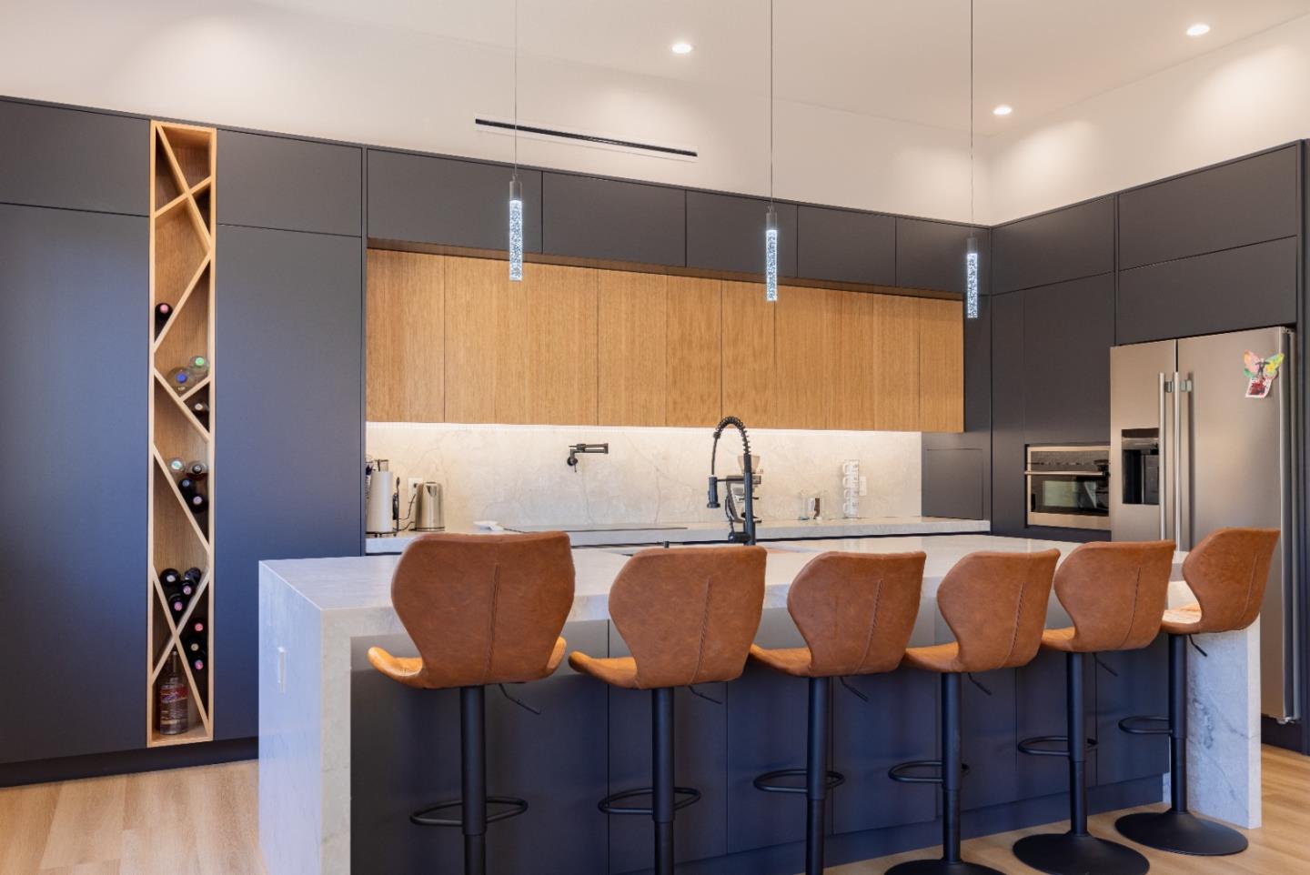 21446 Broadway Road Los Gatos, CA 95033 - Photo 2 of 32 a kitchen with cabinets and chairs