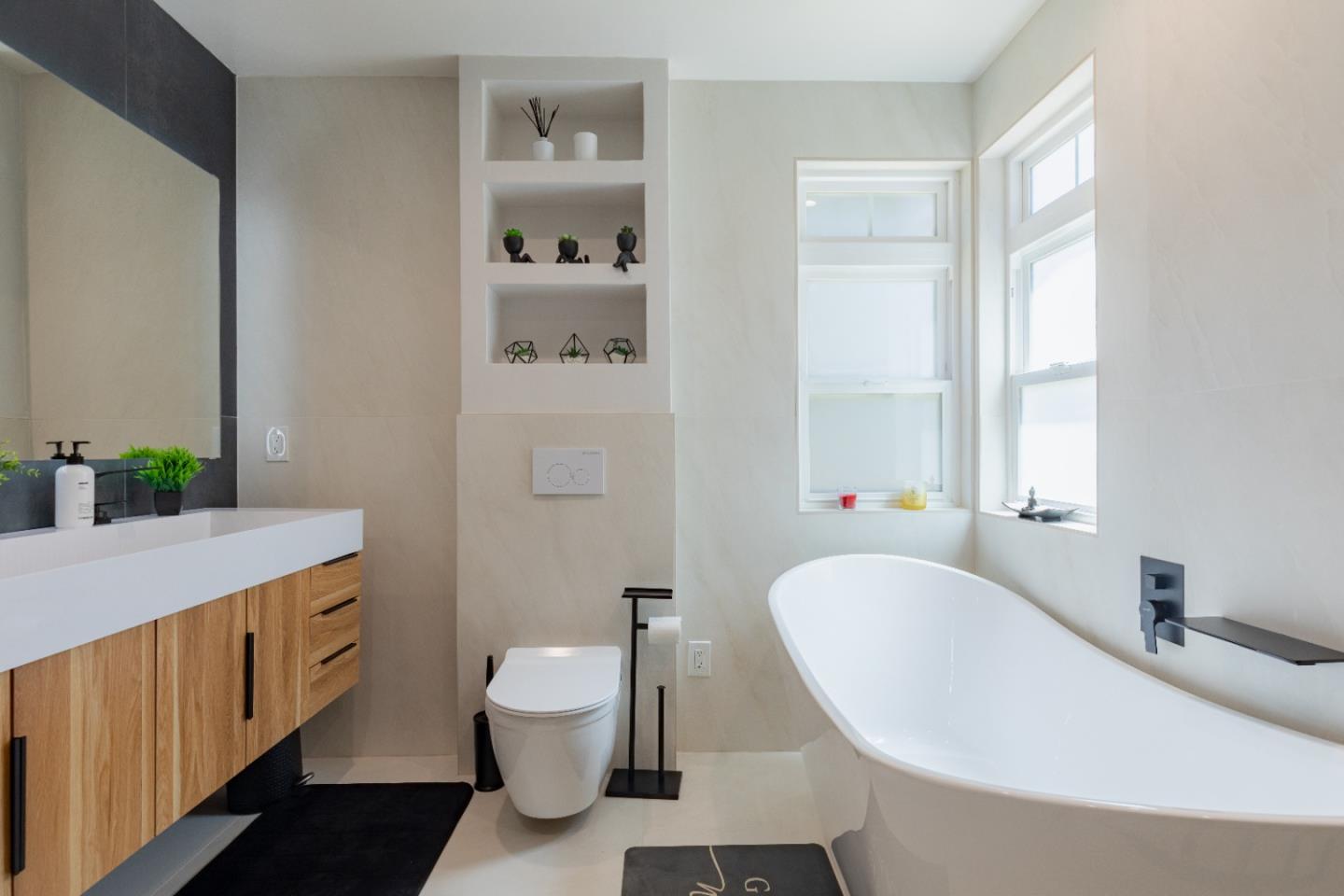 21446 Broadway Road Los Gatos, CA 95033 - Photo 26 of 32 a bathroom with a sink a toilet and tub