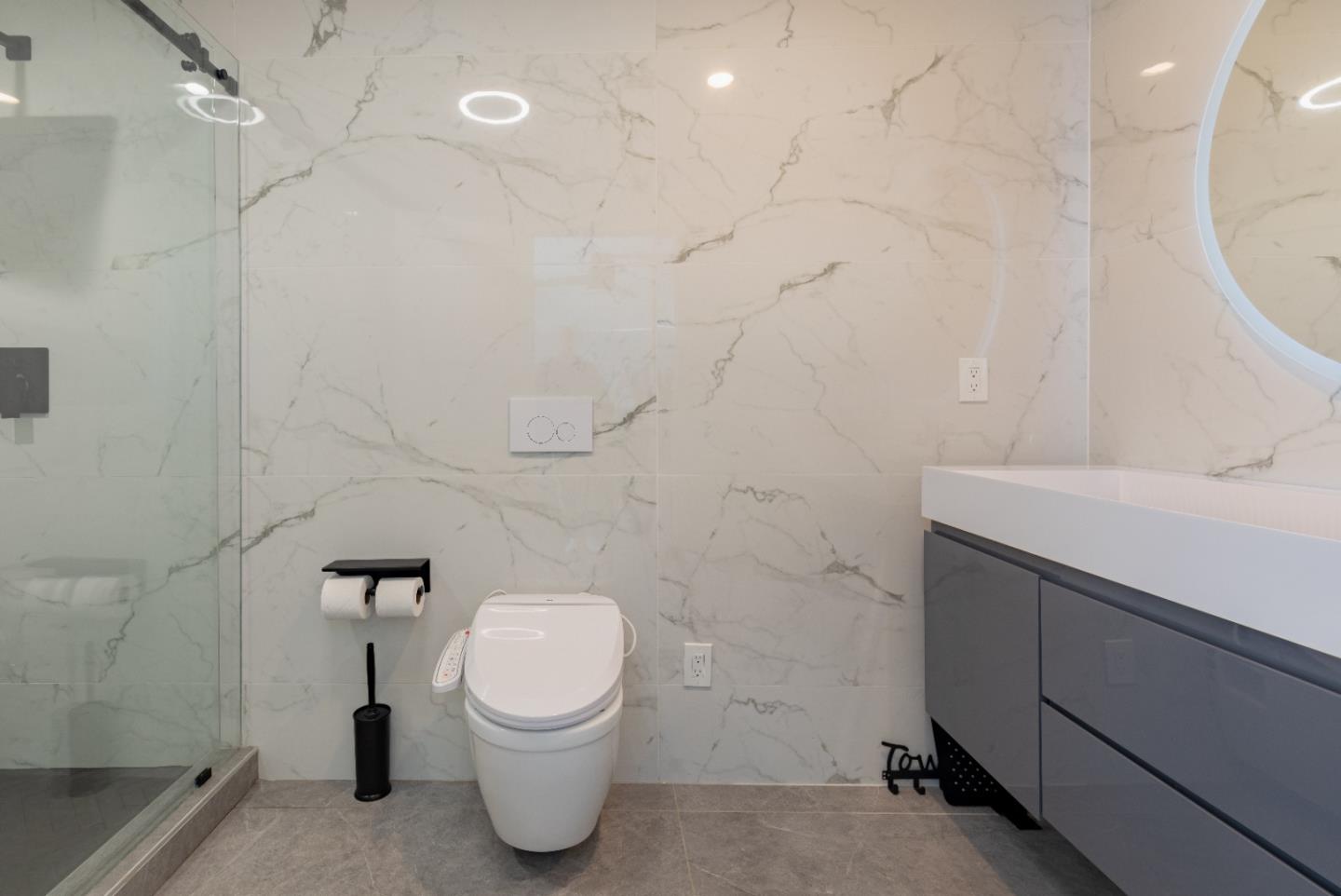 21446 Broadway Road Los Gatos, CA 95033 - Photo 30 of 32 a bathroom with a sink a toilet and a mirror