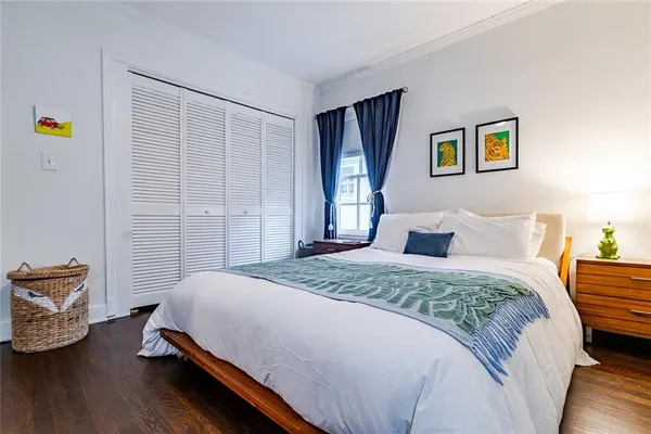 a view of a bedroom with a large window