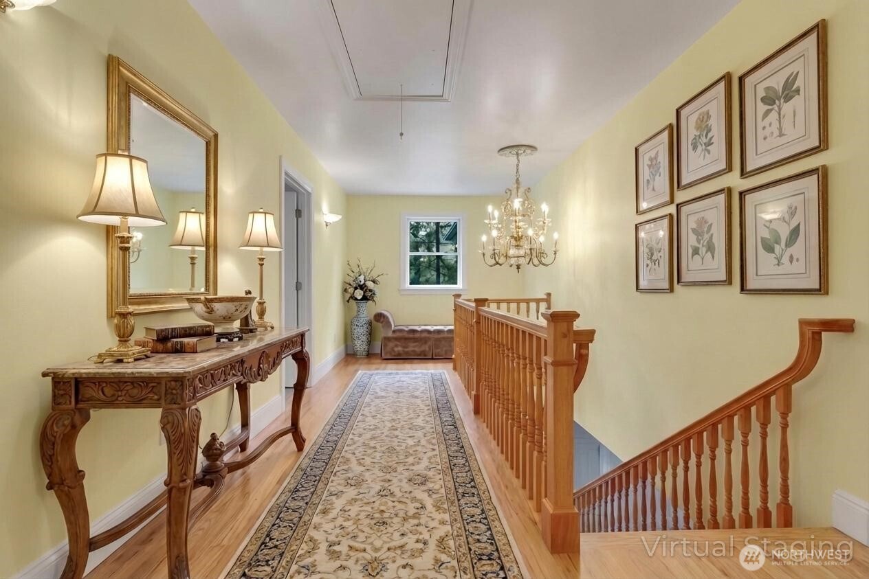 1622 Southwest 140th Street Burien, WA 98166 - Photo 11 of 38 a view of a hallway with furniture and a chandelier