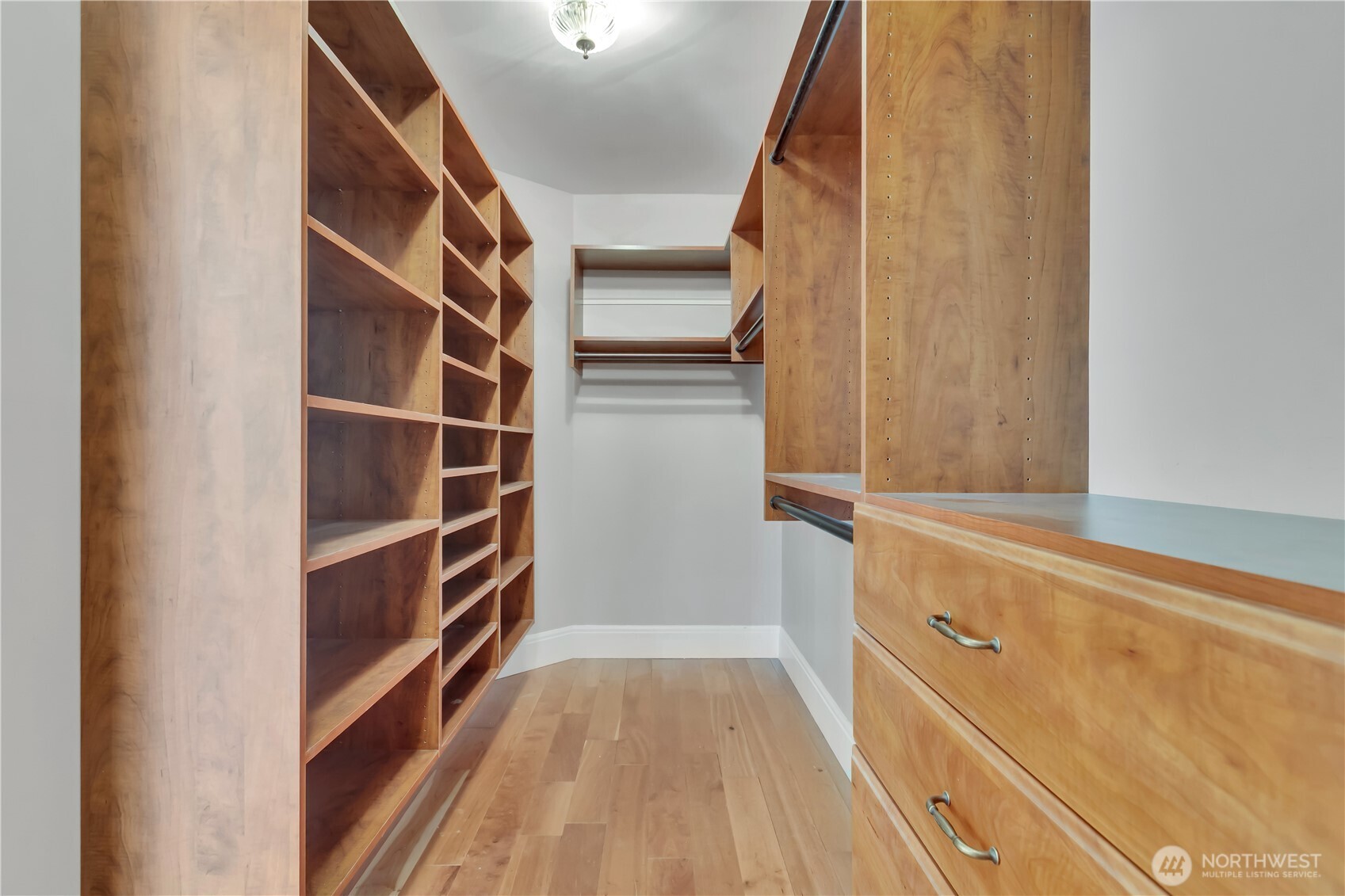 1622 Southwest 140th Street Burien, WA 98166 - Photo 15 of 38 a view of walk in closet with empty racks