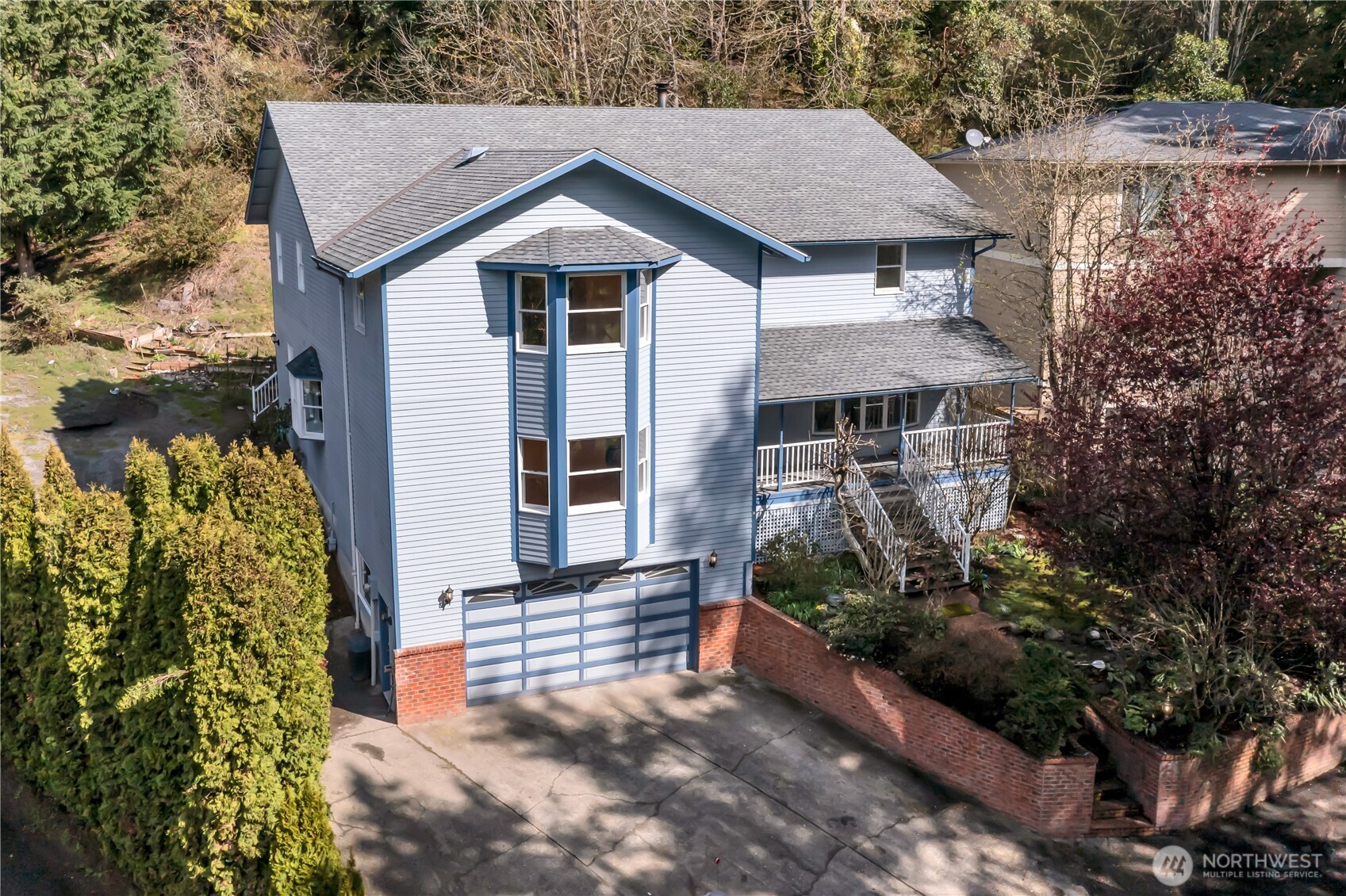 1622 Southwest 140th Street Burien, WA 98166 - Photo 2 of 38 a front view of a house with a yard