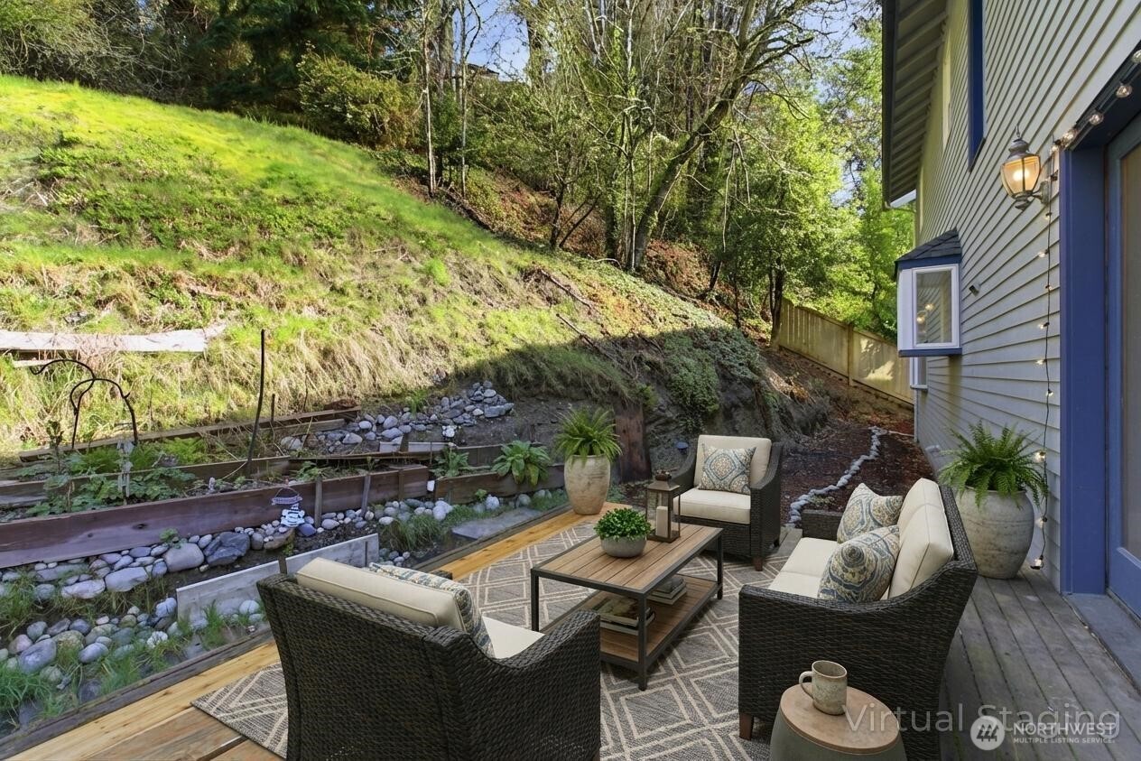 1622 Southwest 140th Street Burien, WA 98166 - Photo 25 of 38 a view of a patio with couches table and chairs and potted plants