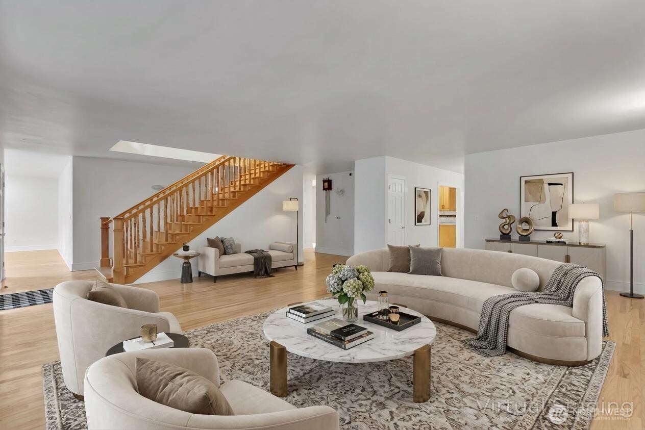 1622 Southwest 140th Street Burien, WA 98166 - Photo 3 of 38 a living room with furniture couches and a dining table with wooden floor